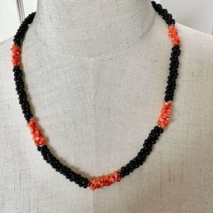 Black onyx  beaded and coral long twisted necklace